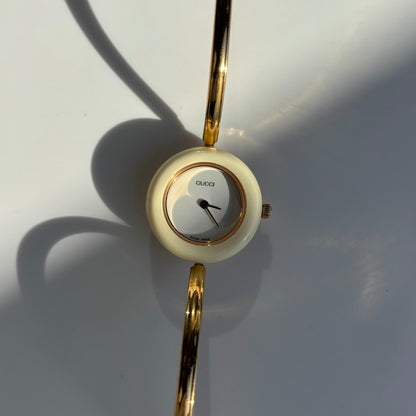 Gucci 1990s Interchangeable Bezel Gold Plated Bangle Watch with 12 bezels, case