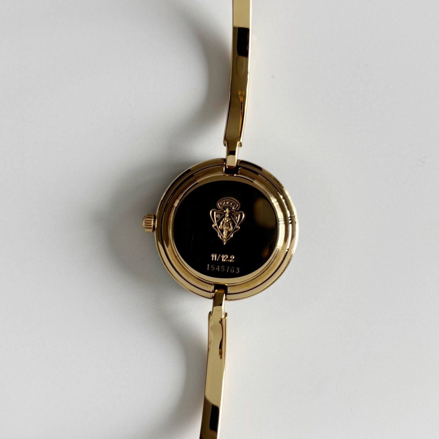 Gucci 1990s Interchangeable Bezel Gold Plated Bangle Watch with 12 bezels, case