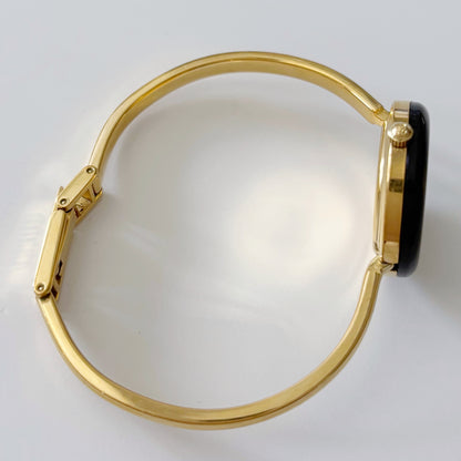 Gucci 1990s Interchangeable Bezel Gold Plated Bangle Watch with 12 bezels, case