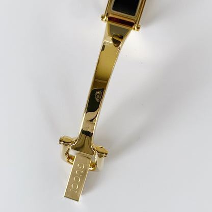 Gucci 1990s Black Dial Rectangular Gold Plated Bangle Watch