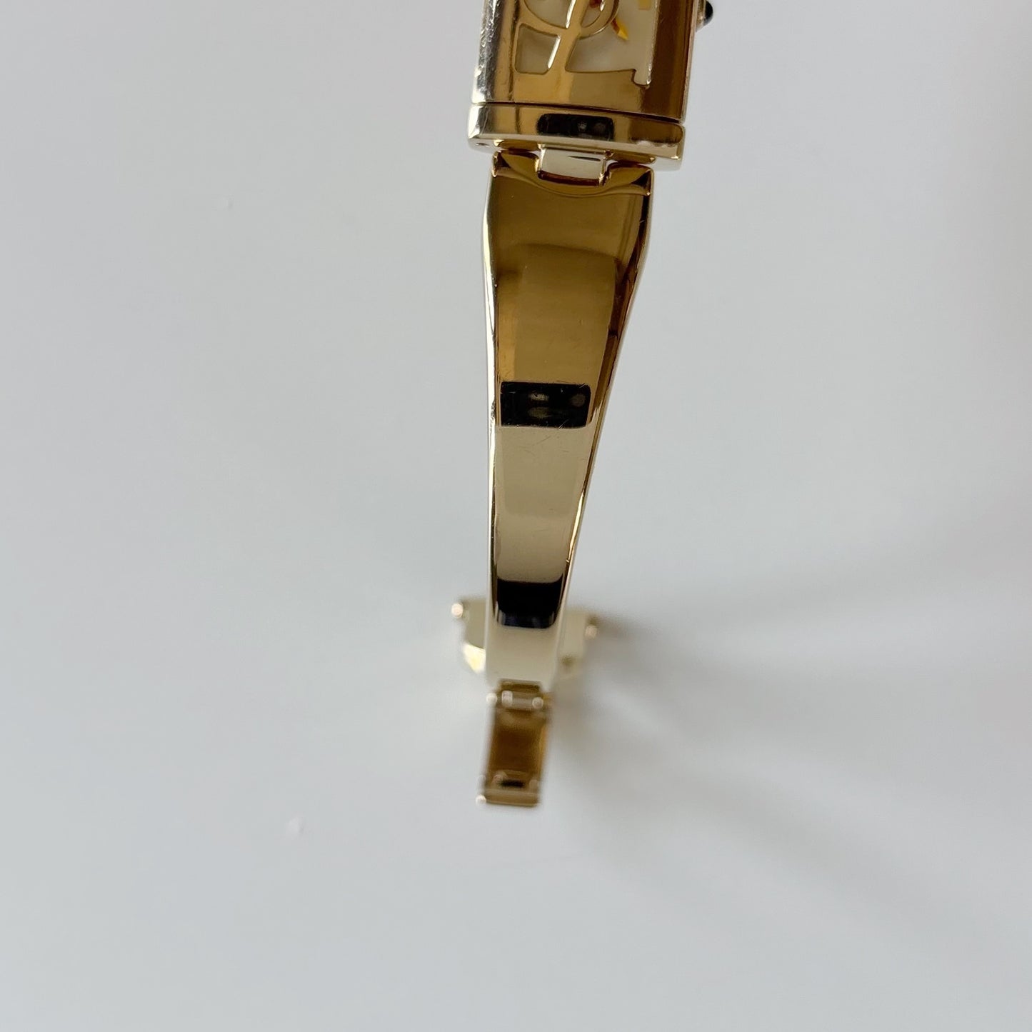 Yves Saint Laurent 1990s Peek a boo Gold Plated Bangle Watch