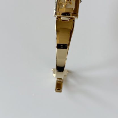 Yves Saint Laurent 1990s Peek a boo Gold Plated Bangle Watch