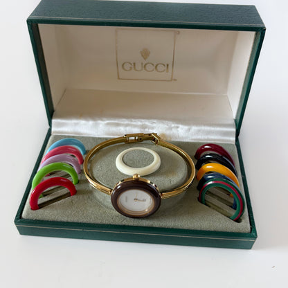 Gucci 1990s Interchangeable Bezel Gold Plated Bangle Watch with 12 bezels, case