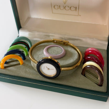 Gucci 1990s Interchangeable Bezel Gold Plated Bangle Watch with 12 bezels, case