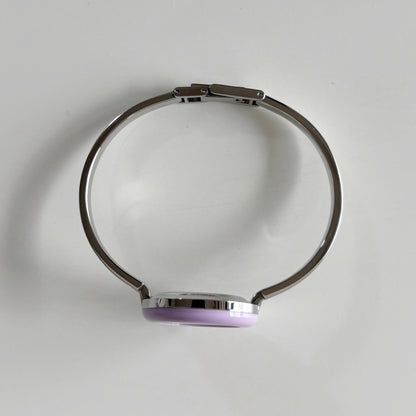 Gucci 1990s Interchangeable Bezel Stainless Steel Bangle Watch with 12 bezels, case