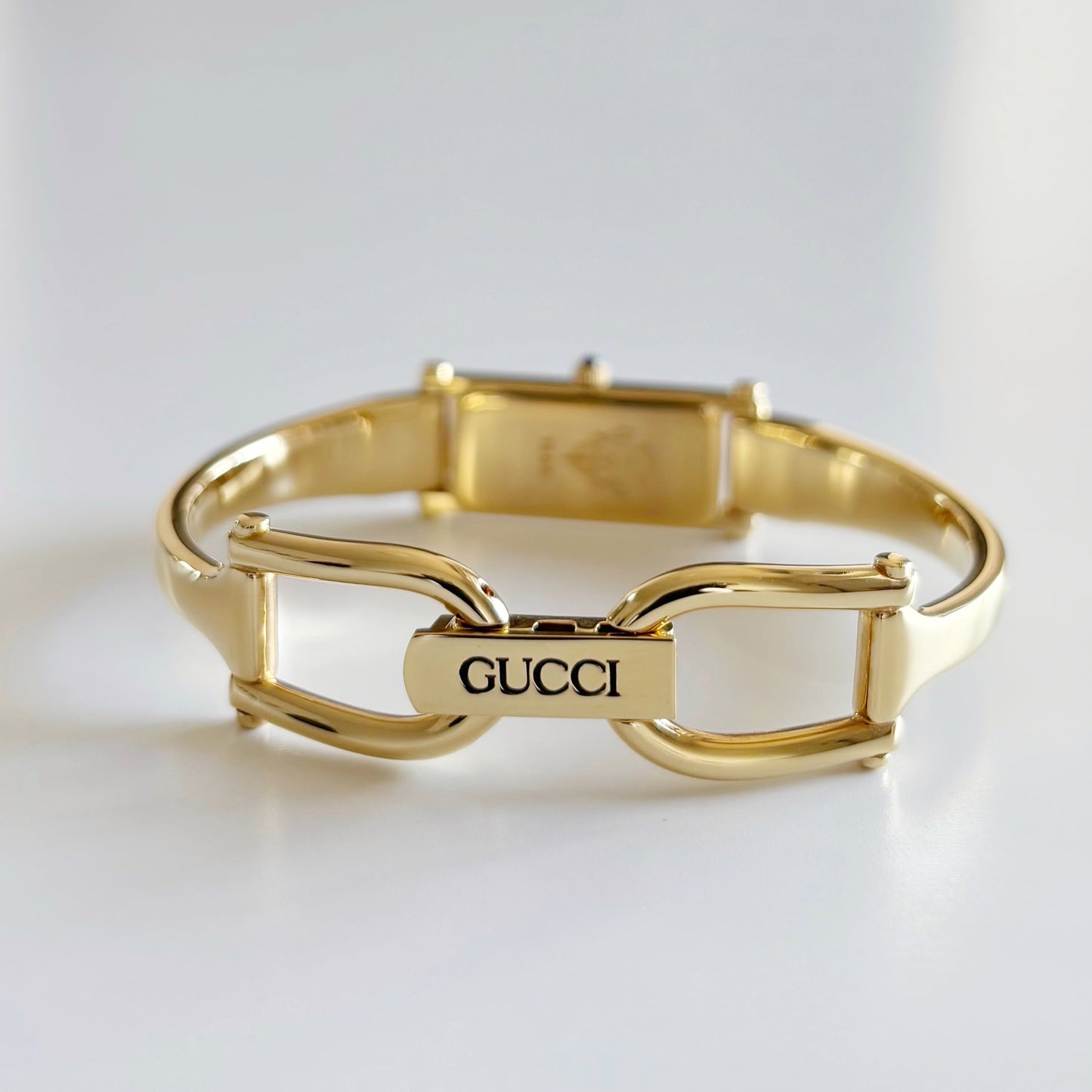 Gucci 1990s Rectangular Dial Gold Plated Bangle Watch