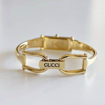 Gucci 1990s Rectangular Dial Gold Plated Bangle Watch