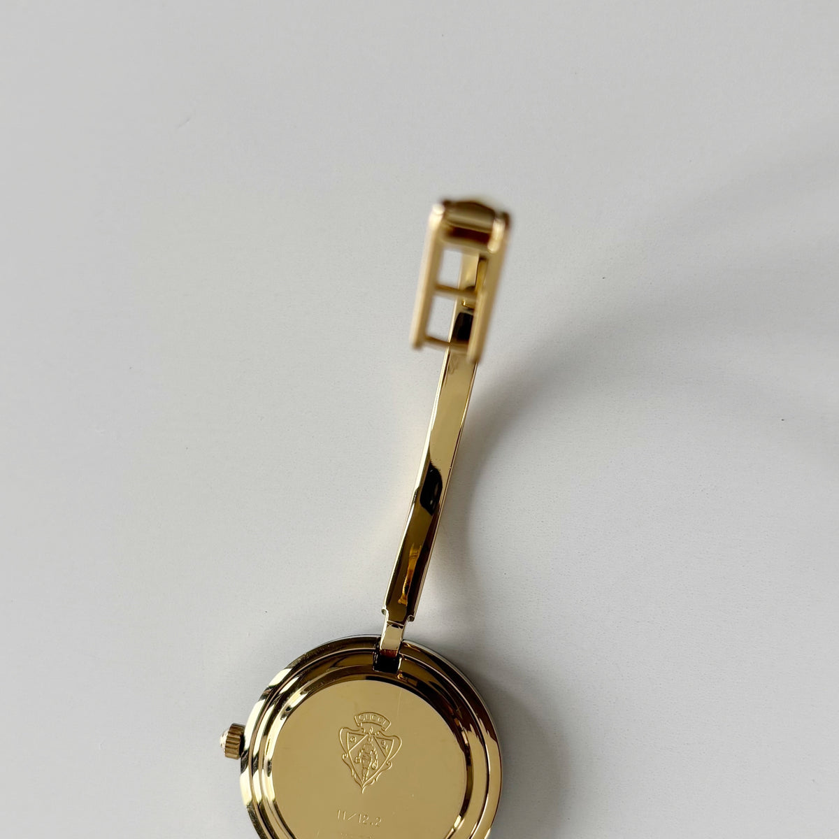 Gucci 1990s Interchangeable Bezel Gold Plated Bangle Watch with 12 bezels, case