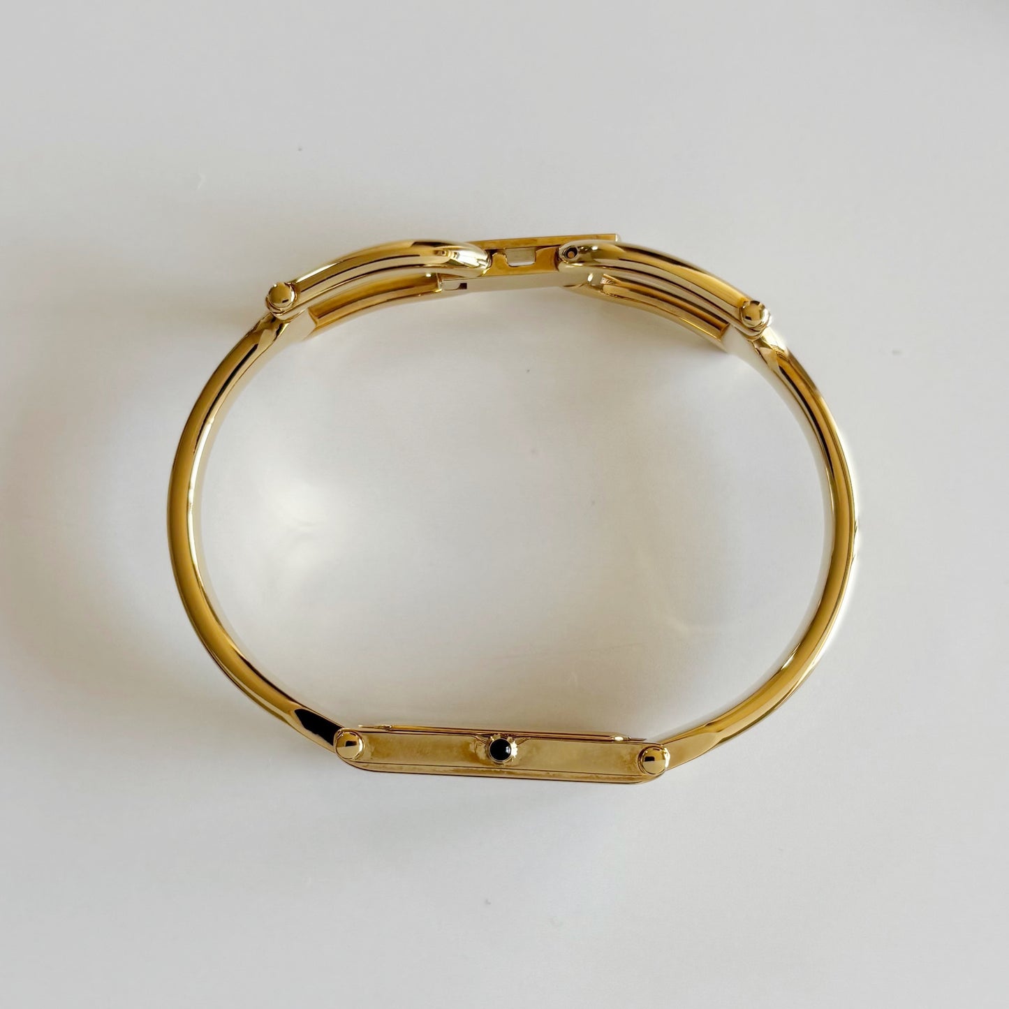 Gucci 1990s Rectangular Dial Gold Plated Bangle Watch