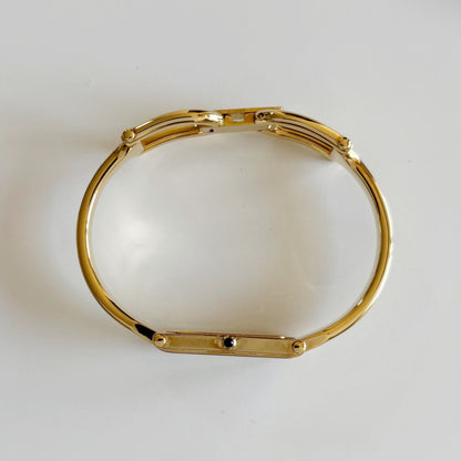 Gucci 1990s Rectangular Dial Gold Plated Bangle Watch