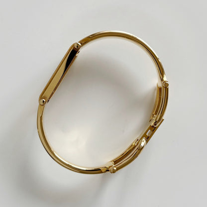 Gucci 1990s Rectangular Black Dial Gold Plated Bangle Watch