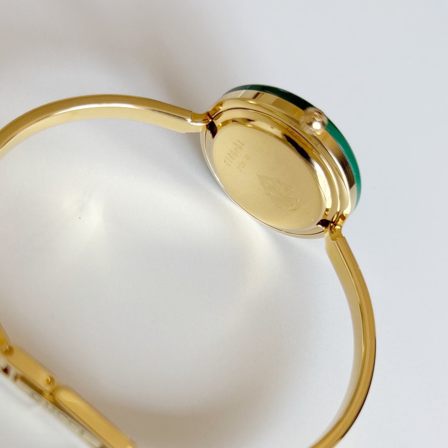 Gucci 1990s Interchangeable Bezel Gold Plated Bangle Watch with 12 bezels, case