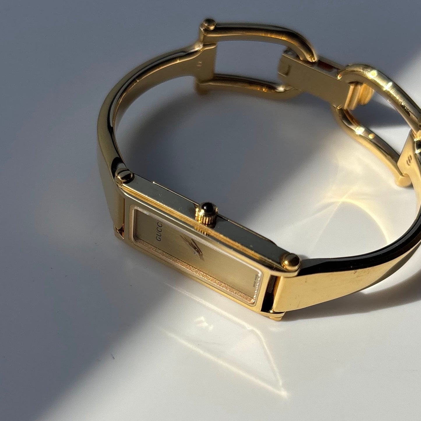 Gucci 1990s Gold Dial Gold Plated Bangle Watch (Small)
