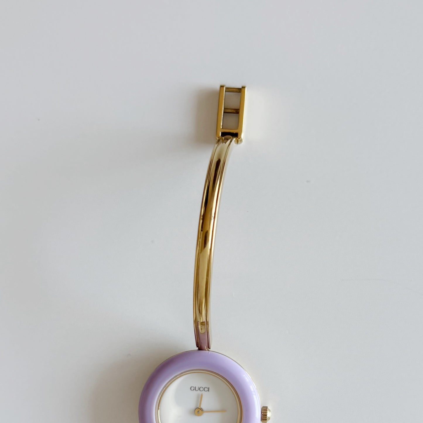 Gucci 1990s Interchangeable Bezel Gold Plated Bangle Watch with 12 bezels, case
