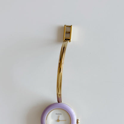 Gucci 1990s Interchangeable Bezel Gold Plated Bangle Watch with 12 bezels, case