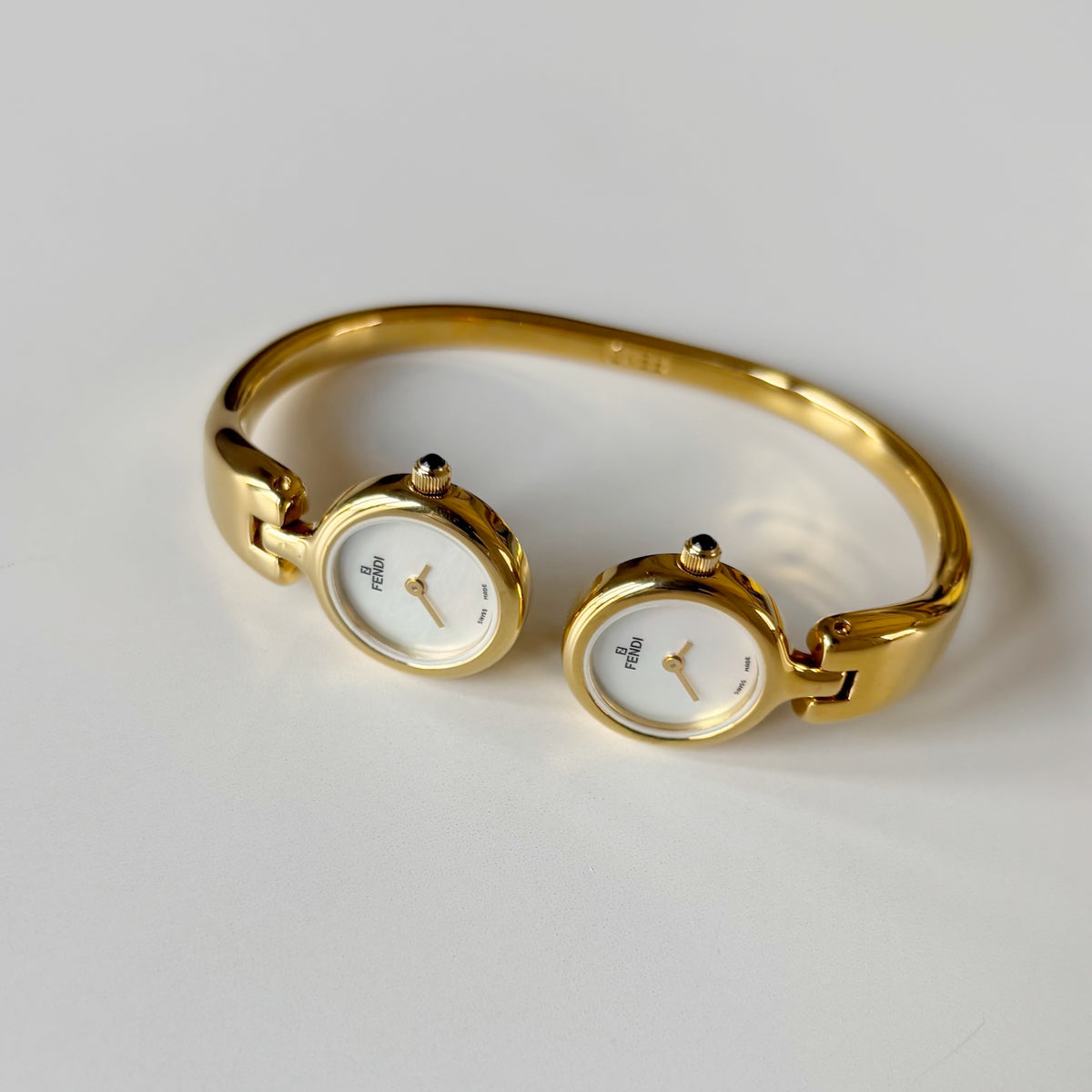 Fendi 1990s Seashell Dial Two Time Zone Gold Plated Bangle Watch