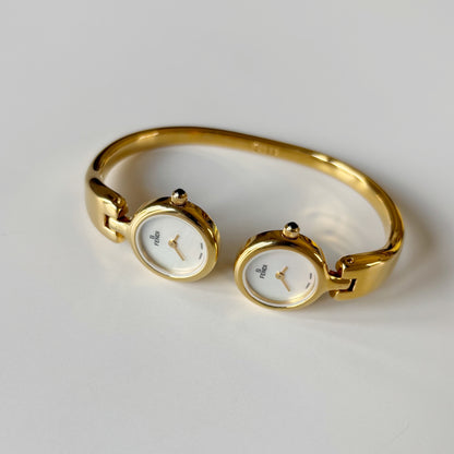 Fendi 1990s Seashell Dial Two Time Zone Gold Plated Bangle Watch