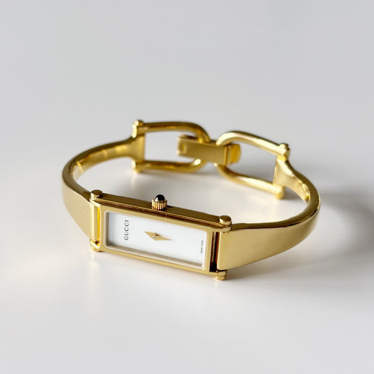 Gucci 1990s Seashell Dial Rectangular Gold Plated Bangle Watch
