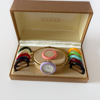 Gucci 1990s Interchangeable Bezel Gold Plated Bangle Watch with 12 bezels, case