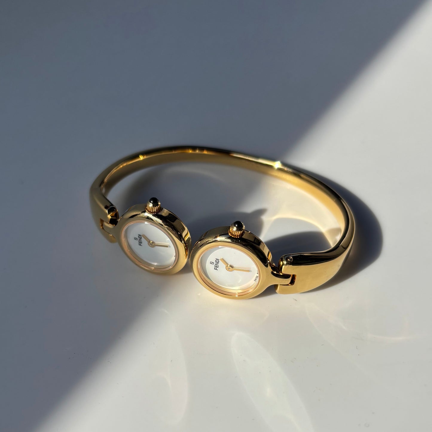 Fendi 1990s Seashell Dial Two Time Zone Gold Plated Bangle Watch