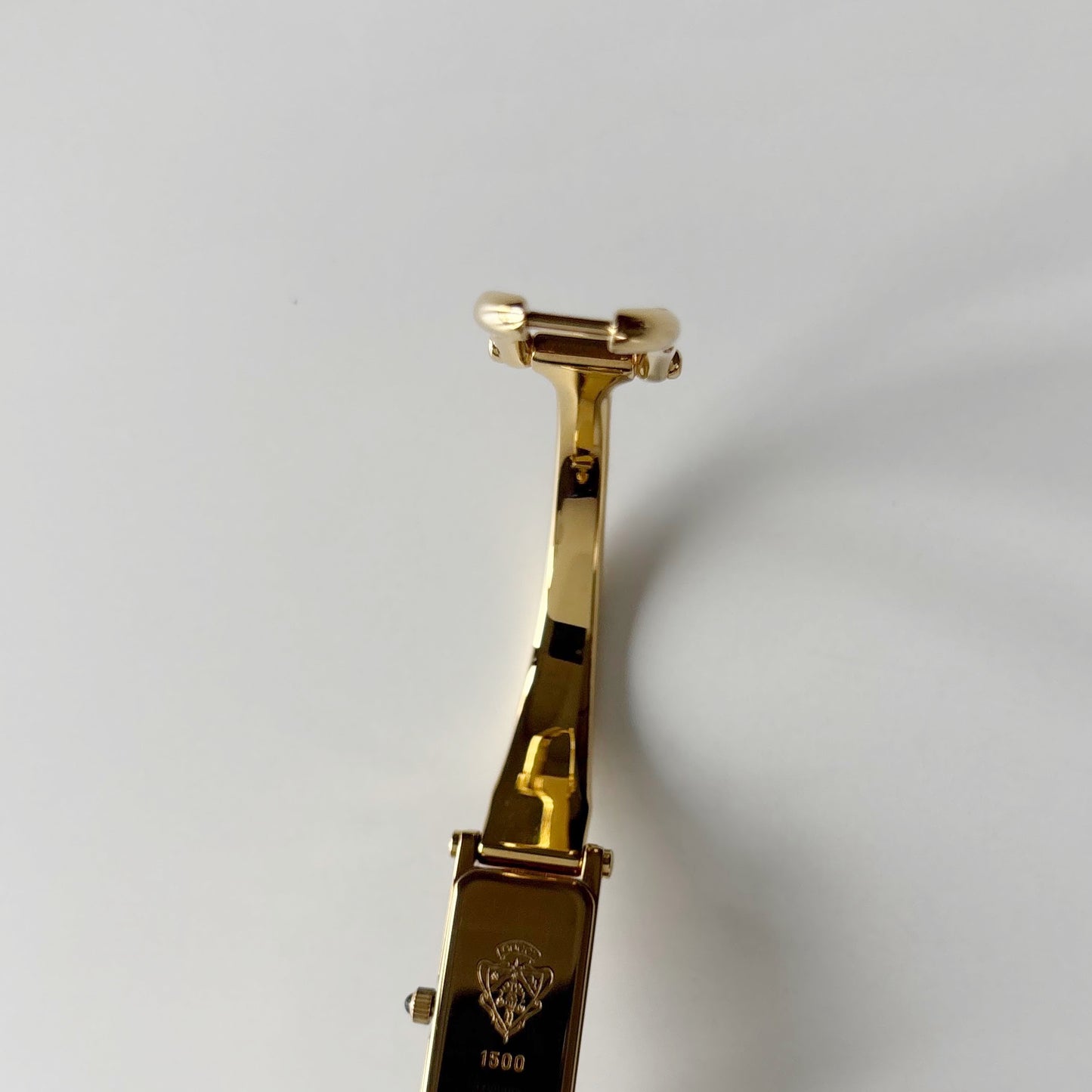 Gucci 1990s Gold Rectangular Dial Gold Plated Bangle Watch