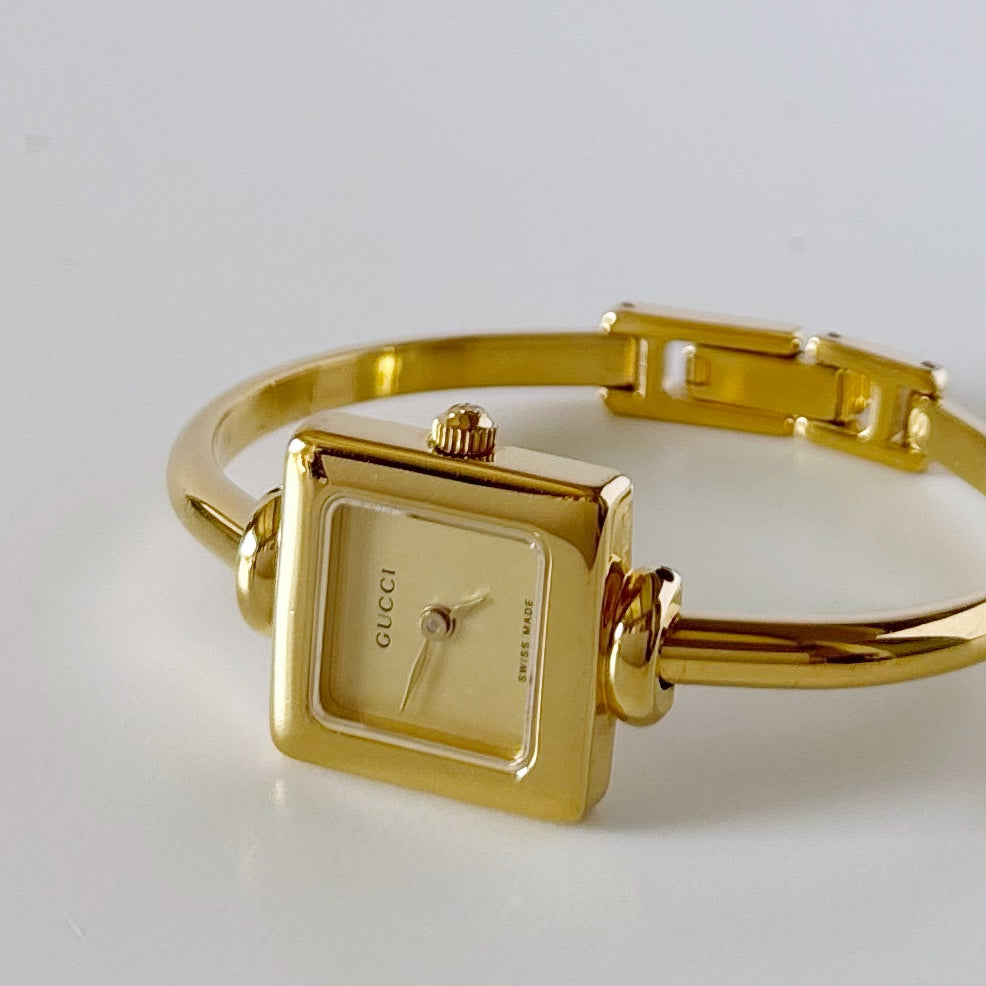 Gucci 1990s Square Dial Gold Plated Bangle Watch (Small)