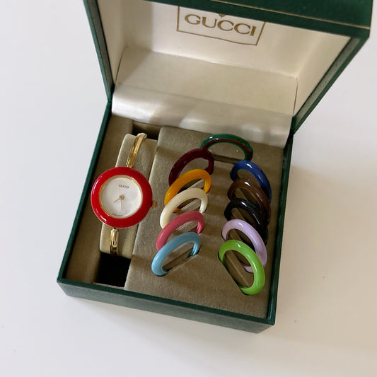 Gucci 1990s Interchangeable Bezel Gold Plated Bangle Watch with 12 bezels, case