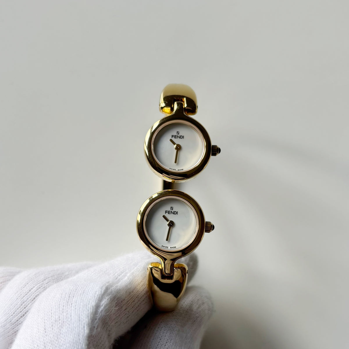 Fendi 1990s Seashell Dial Two Time Zone Gold Plated Bangle Watch