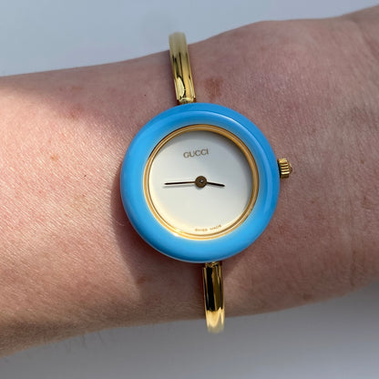 Gucci 1990s Interchangeable Bezel Gold Plated Bangle Watch with 12 bezels, case