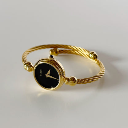 Gucci 1990s Black Dial Gold Plated Cable Bangle Watch
