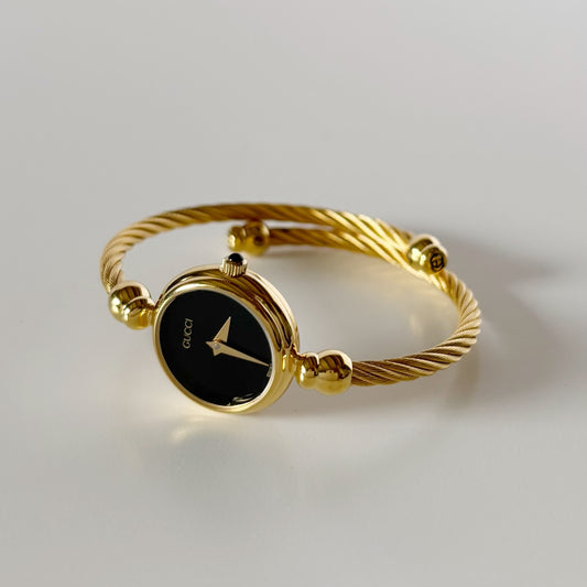 Gucci 1990s Black Dial Gold Plated Cable Bangle Watch