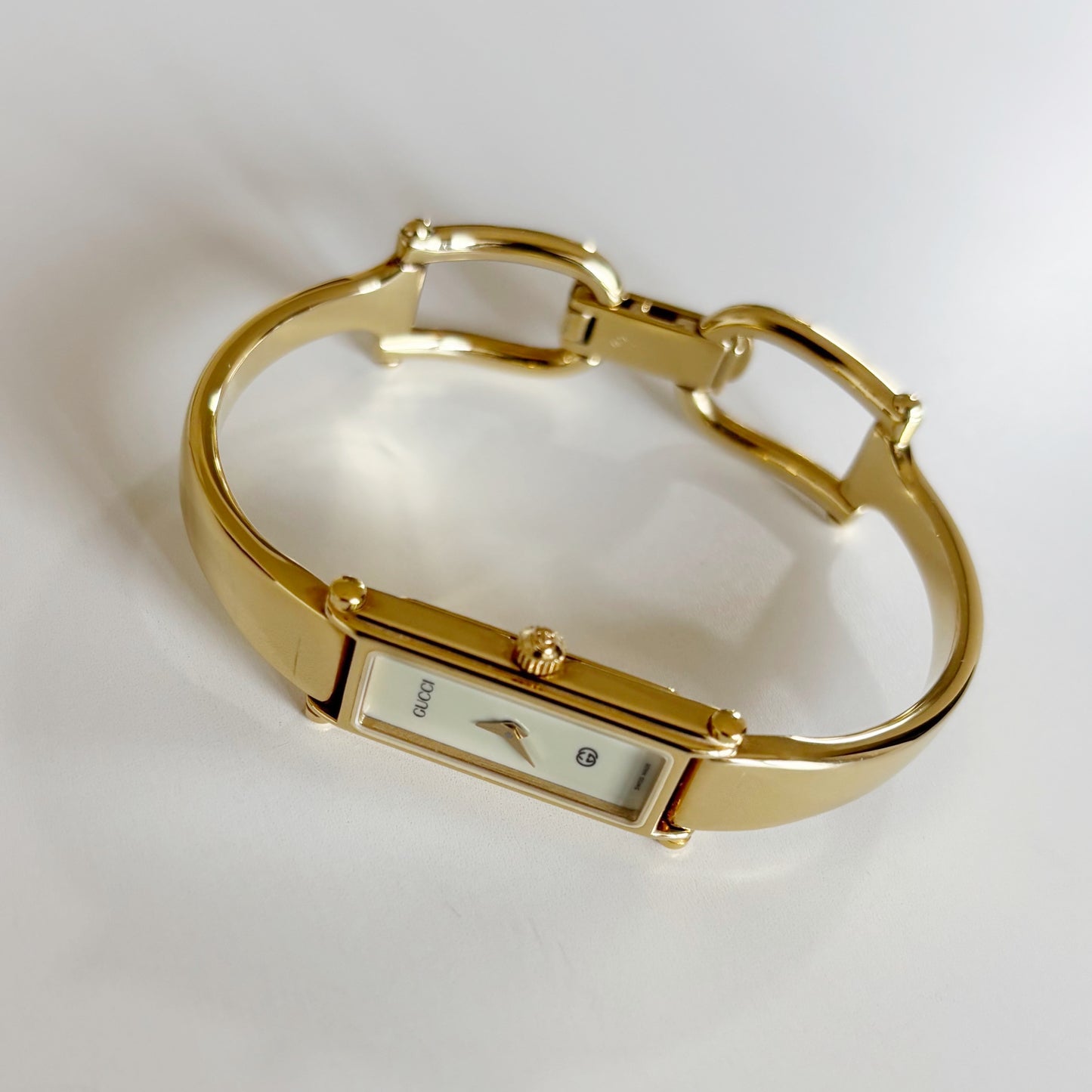 Gucci 1990s Cream Dial Rectangular Gold Plated Bangle Watch