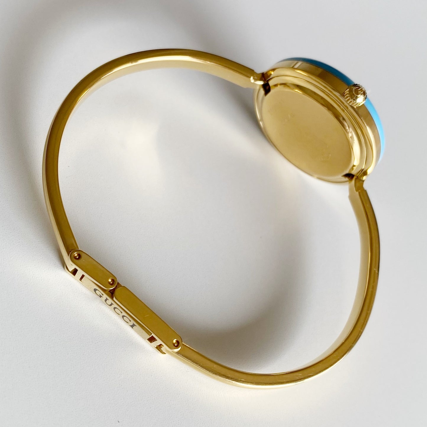 Gucci 1990s Interchangeable Bezel Gold Plated Bangle Watch with 12 bezels, case
