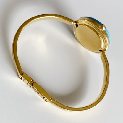 Gucci 1990s Interchangeable Bezel Gold Plated Bangle Watch with 12 bezels, case