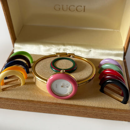 Gucci 1990s Interchangeable Bezel Gold Plated Bangle Watch with 12 bezels, case