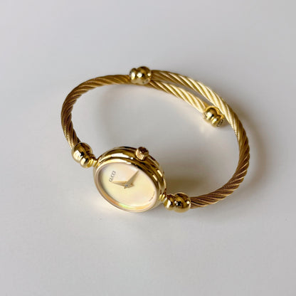 Gucci 1990s Seashell Dial Gold Plated Cable Bangle Watch