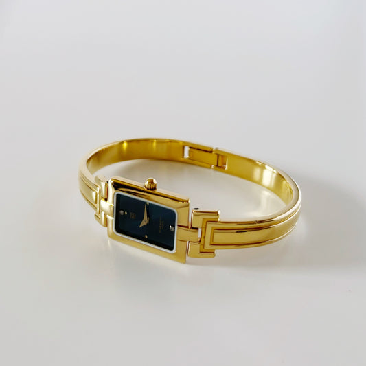 Givenchy 1990s Navy Dial Gold Plated Bangle Watch