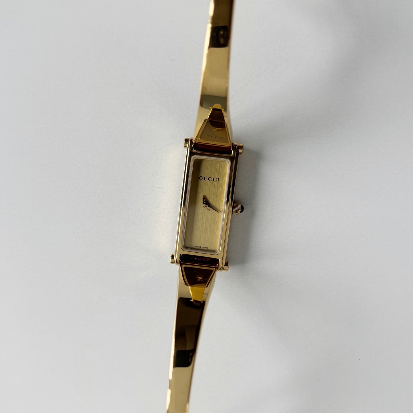 Gucci 1990s Gold Rectangular Dial Gold Plated Bangle Watch