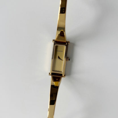 Gucci 1990s Gold Rectangular Dial Gold Plated Bangle Watch