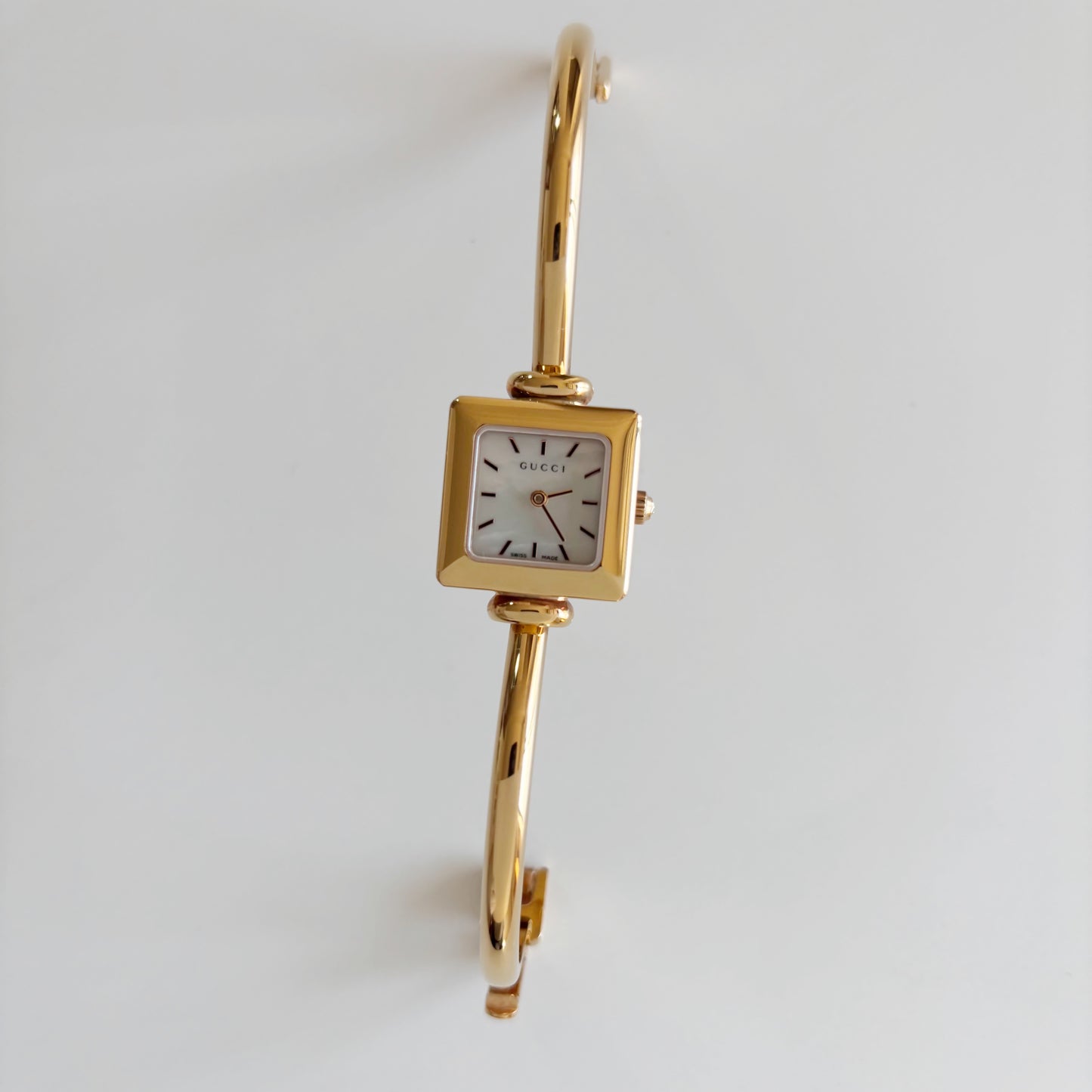 Gucci 1990s Seashell Square Dial Gold Plated Bangle Watch