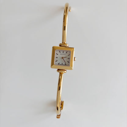 Gucci 1990s Seashell Square Dial Gold Plated Bangle Watch