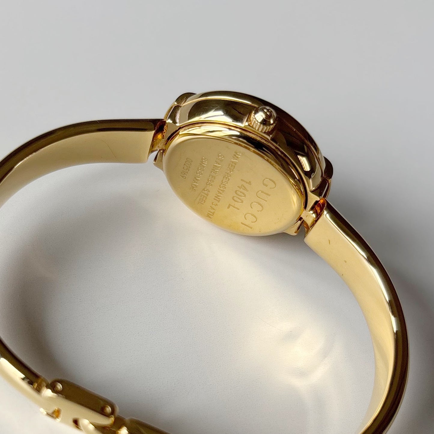 Gucci 1990s Round Dial Gold Plated Bangle Watch