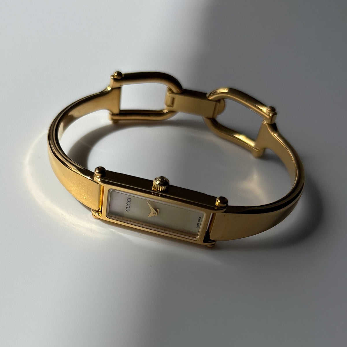 Gucci 1990s Seashell Rectangular Dial Gold Plated Bangle Watch