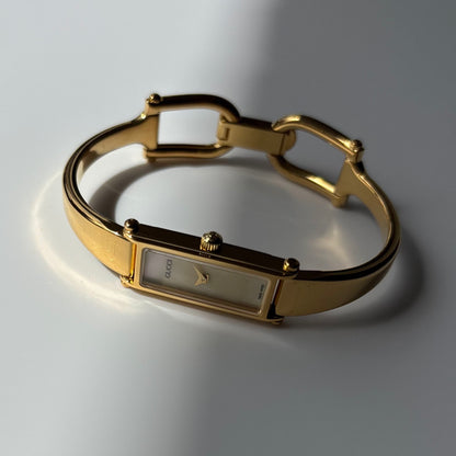 Gucci 1990s Seashell Rectangular Dial Gold Plated Bangle Watch