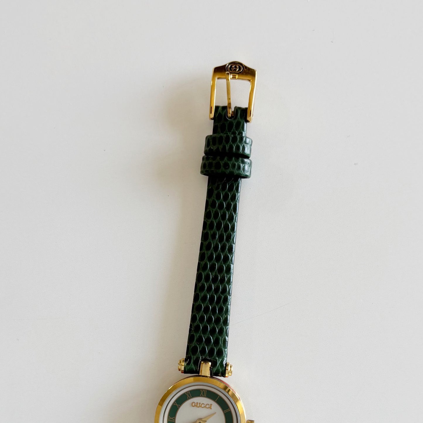Gucci 1990s Round Dial Green Gold Plated Watch