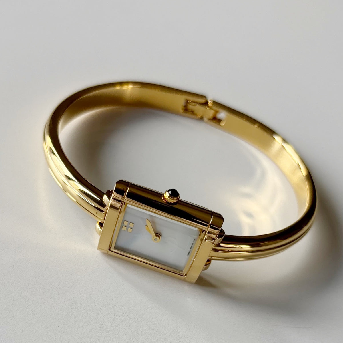 Yves Saint Laurent 1990s Seashell Dial Gold Plated Bangle Watch
