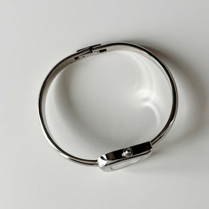 Yves Saint Laurent 1990s Heart Shaped Dial Silver Bangle Watch