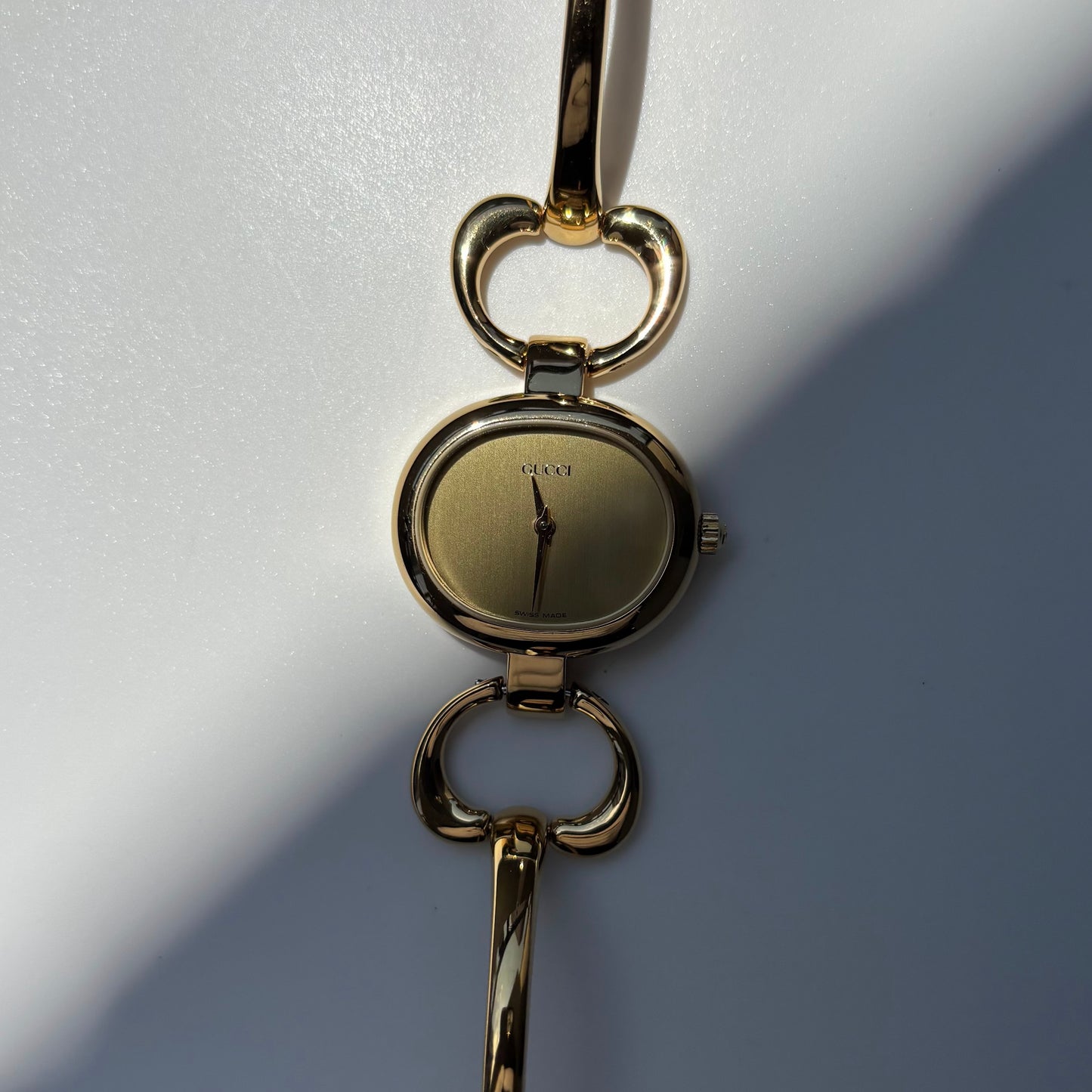 Gucci 1990s Oval Dial Gold Plated Bangle Watch