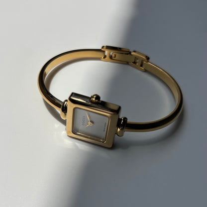 Gucci 1990s Square Dial Gold Plated Bangle Watch
