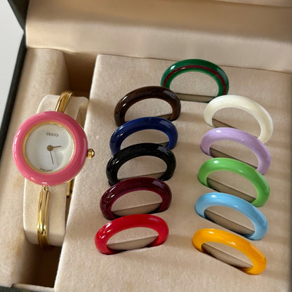 Gucci 1990s Interchangeable Bezel Gold Plated Bangle Watch with 12 bezels, case